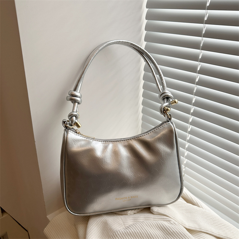 Spring niche solid-color underarm bag, fashionable single-shoulder small bag, a new 2025 popular commuter crossbody bag for women full figure