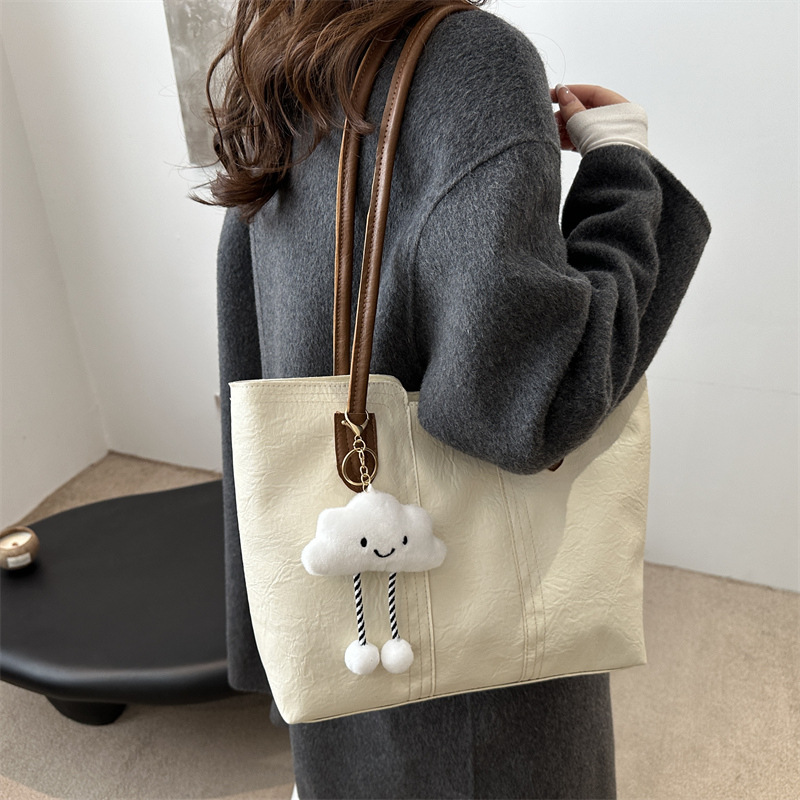 A new 2024 winter versatile and simple handbag with a large capacity single-shoulder tote bag for casual work and commuting details Picture