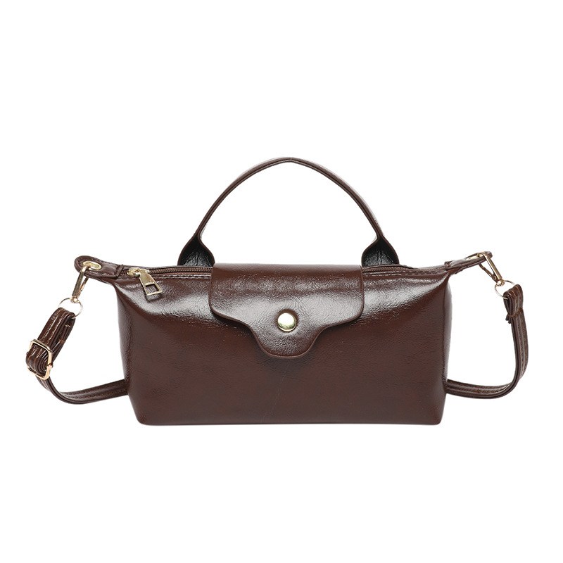 The 2025 new versatile casual handbag, a single-shoulder crossbody bag, is a niche, simple, solid-color, lightweight, and high-end commuter bag for women Item Picture