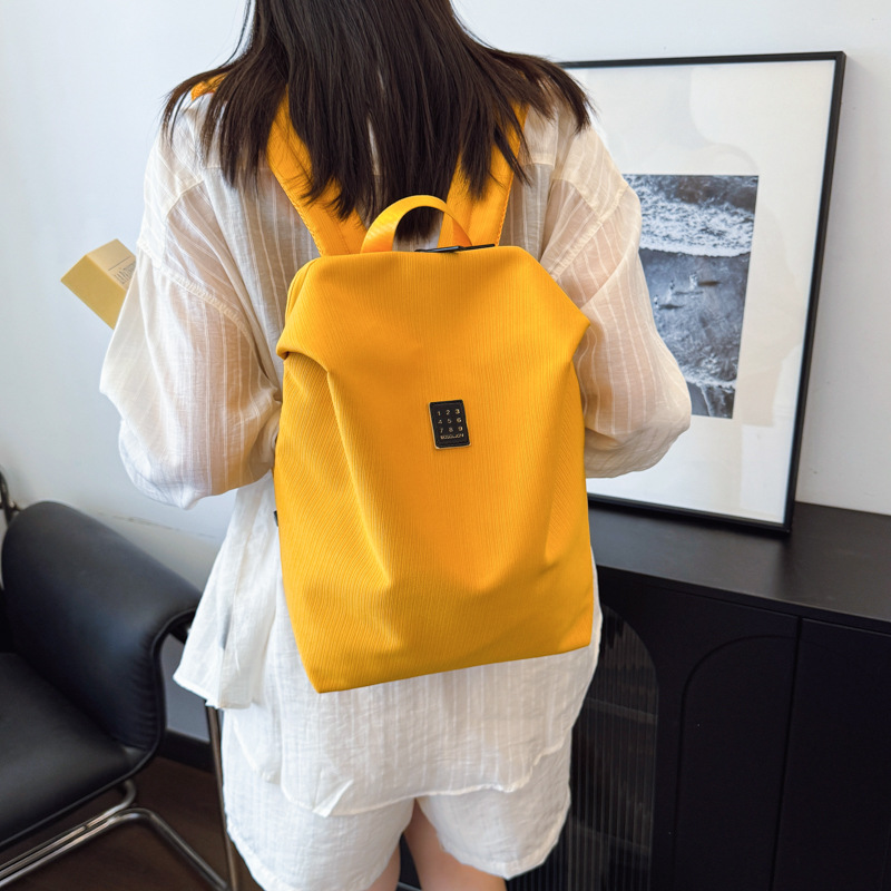 This backpack is light and airy for women, with a large capacity, a tablet, and is suitable for commuting. It is simple and casual for students and can be used with logos Application Scenario