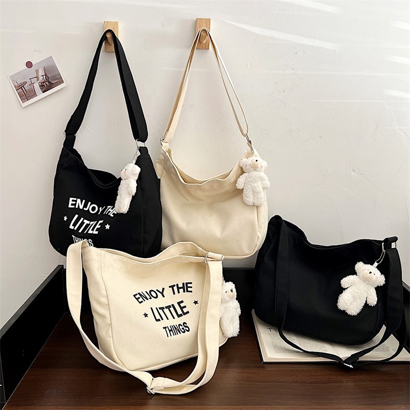 Large-capacity letter tote bag 2024 new solid color stylish hand-held canvas bag, fashionable and simple single-shoulder bag for cross-border full figure