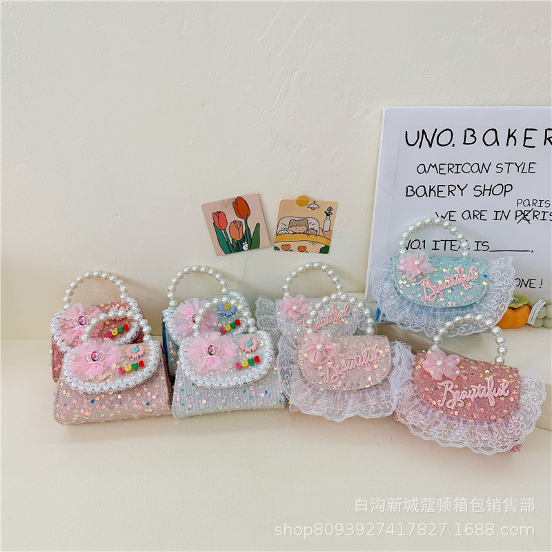 Wholesale children's bags, fashionable and trendy crossbody bags, girls' stylish pearl handbags, mini and cute single-shoulder crossbody bags full figure