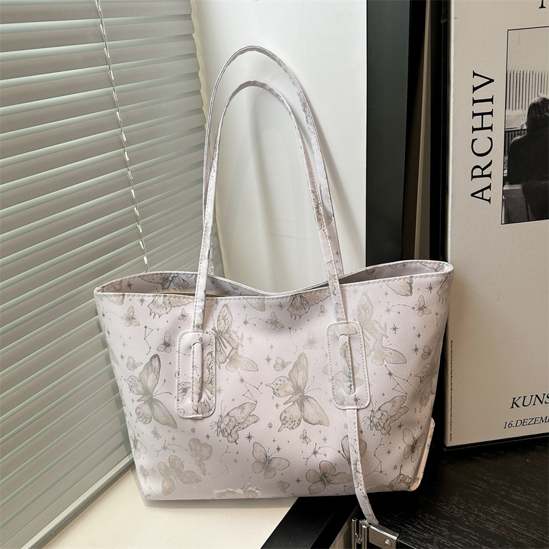 A fresh and elegant butterfly print 2025 summer new artistic style large-capacity casual single-shoulder underarm tote bag full figure