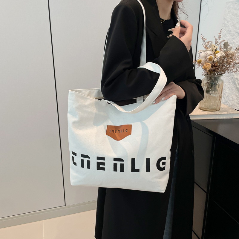 A large-capacity canvas bag for women's spring, a new 2025 casual single-shoulder tote bag for college students' commuting to class Specification drawing