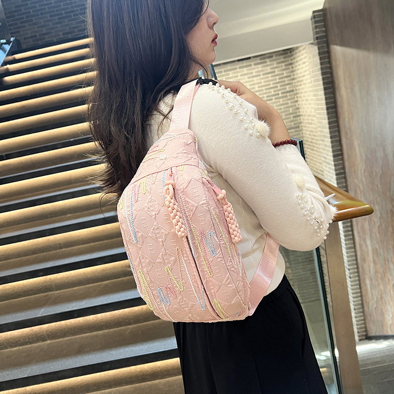 A stylish girl's small backpack with Korean InS-style rhythmic striped embroidered tassel crossbody bag, casual and versatile dumpling bag Specification drawing
