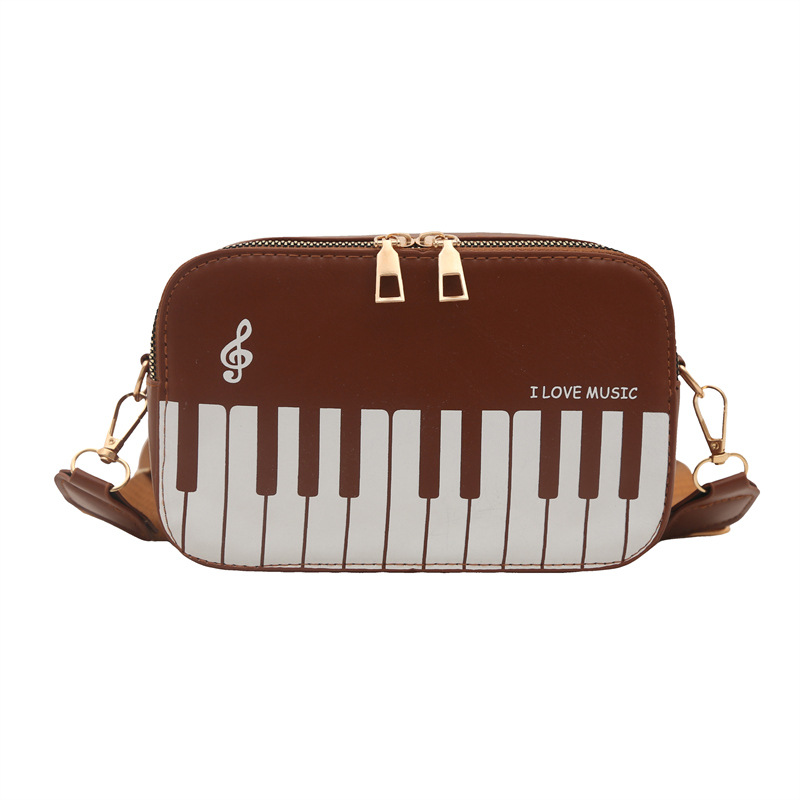 The new spring 2025 fashion color-blocking small square crossbody bag is a sweet and unique piano note single-shoulder bag for girls Item Picture