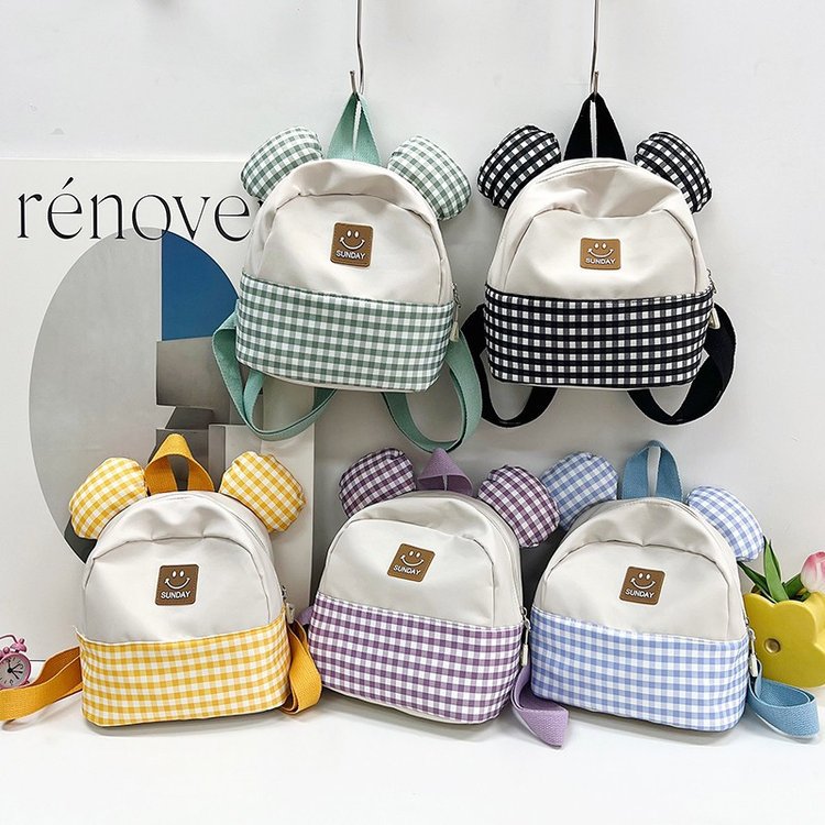 New Korean version double-shoulder children's bags for autumn and winter 2023, fashionable color-blocking cute backpacks for boys and girls, small schoolbags full figure