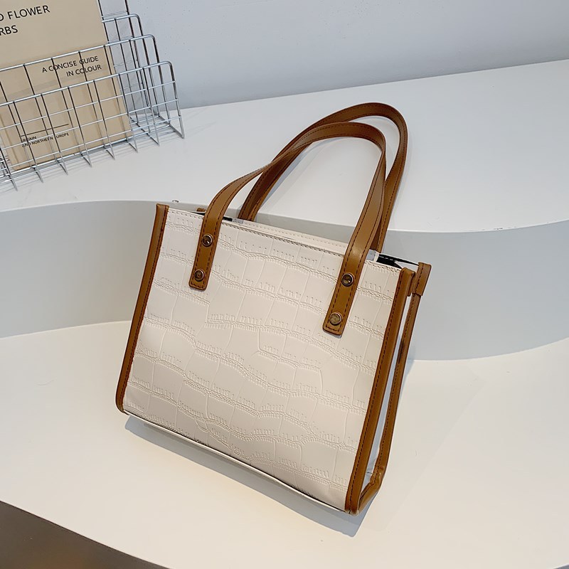Simple and casual single-shoulder bag, new Spring 2025 fashionable women's commuter handbag, stone pattern retro tote bag full figure