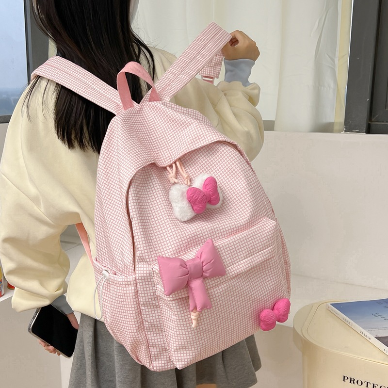 The new summer style of fresh and clean checkered schoolbag for primary school students, cute backpack for junior high school students and girls, ultra-light and lightweight travel backpack details Picture