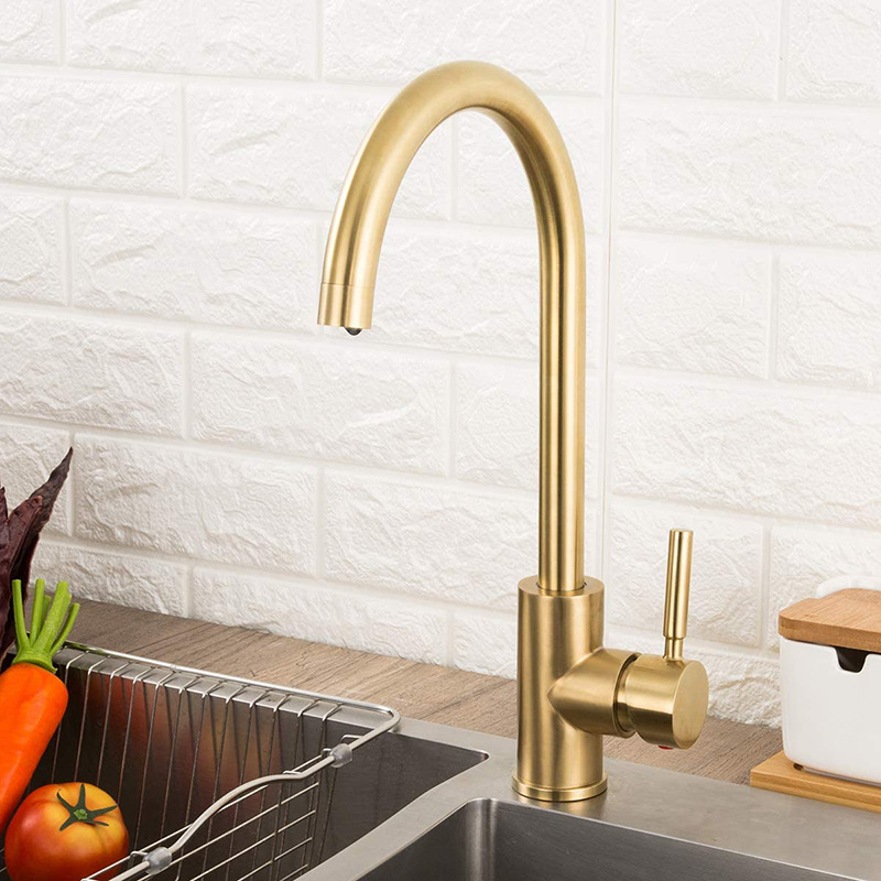 Stainless steel gold kitchen faucet with brushed gold face, washbasin, sink and countertop, mixed kitchen cold and hot water faucet full figure