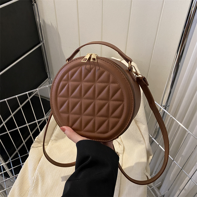 Fashionable, casual, embossed and simple 2025 Spring new style. This year's popular design is the single-shoulder crossbody small round bag full figure