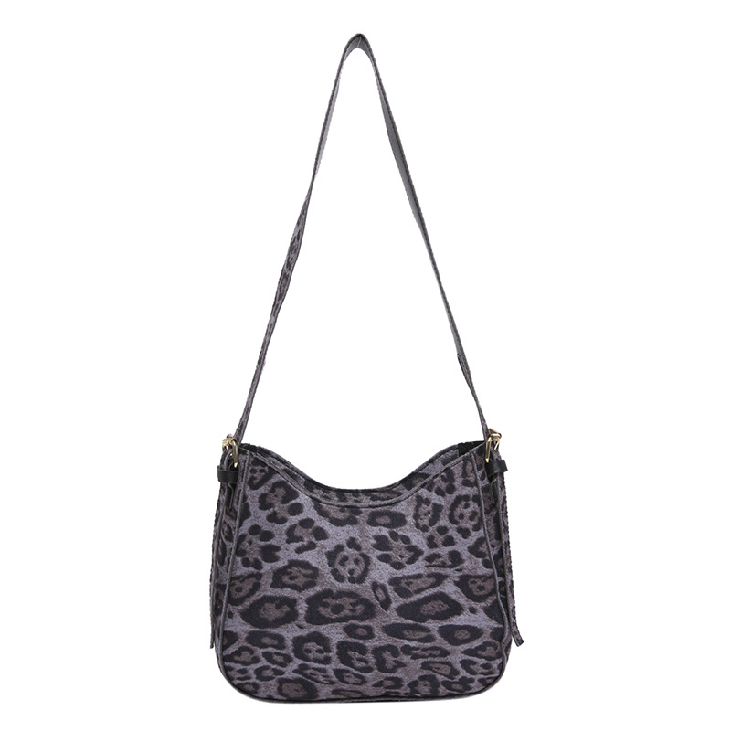 The laid-back leopard print single-shoulder armpit crescent-shaped bag is a new 2024 stylish, simple and niche design for commuting tote bags Item Picture