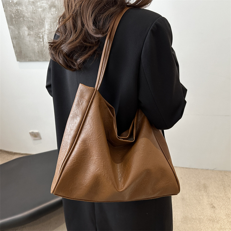 A stylish and unique single-shoulder Instagram solid color trendy Korean-style bag for women, a simple and fashionable handbag and tote bag for women details Picture