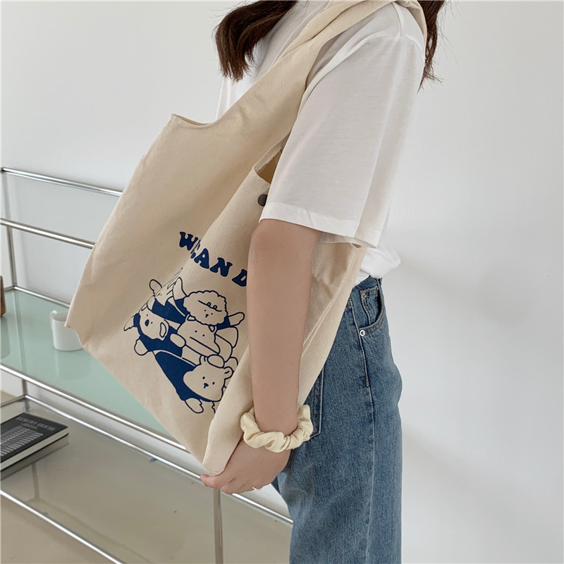 15134 canvas bag for women, Korean version, large-capacity underarm single-shoulder bag, simple and cute cartoon student handbag wholesale Application Scenario