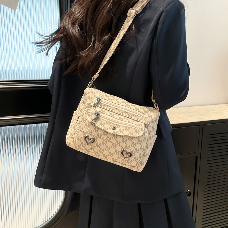 The 2025 new versatile and elegant middle-aged mom bag, multi-layered single-shoulder crossbody bag, granny bag, crossbody backpack details Picture