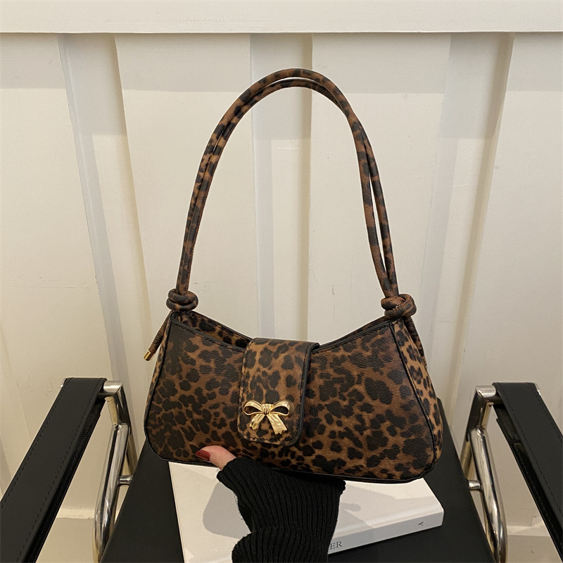 2024 Winter new fashion leopard print long niche French underarm bag, bow single-shoulder crossbody bag for women full figure