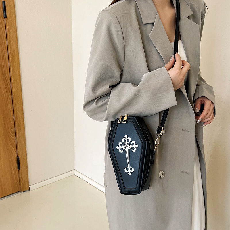 A stylish and elegant women's bag for the winter of 2024, featuring a printed cross with a mobile phone and loose change, is a single-shoulder crossbody bag for women details Picture