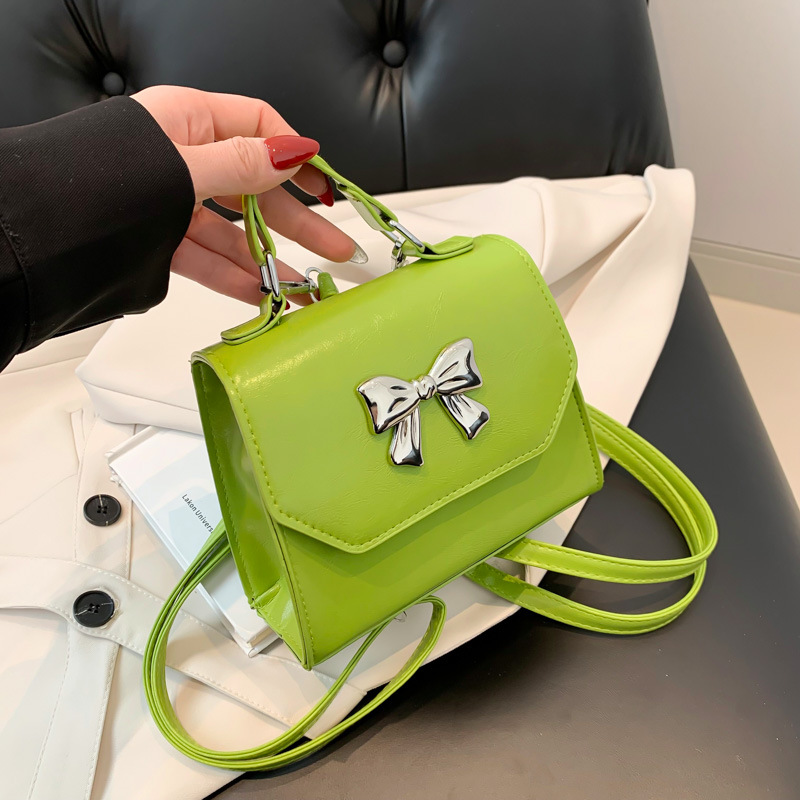 Spring 2025 new solid-color ins single-shoulder crossbody bag, stylish and gentle backpack, bow fashionable handbag full figure
