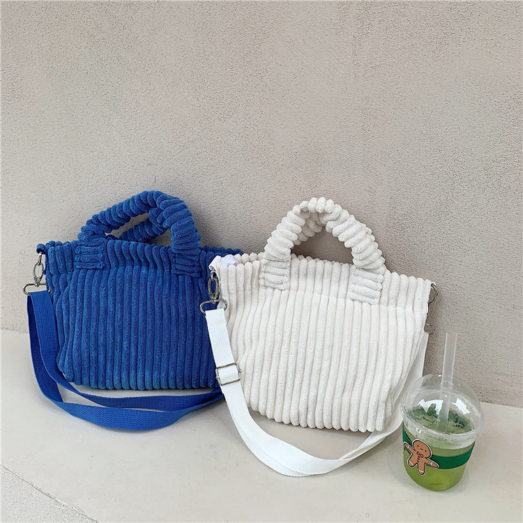 112272 Klein blue hand-held crossbody small bag corduroy Korean cute hand-held tote bag student trend full figure