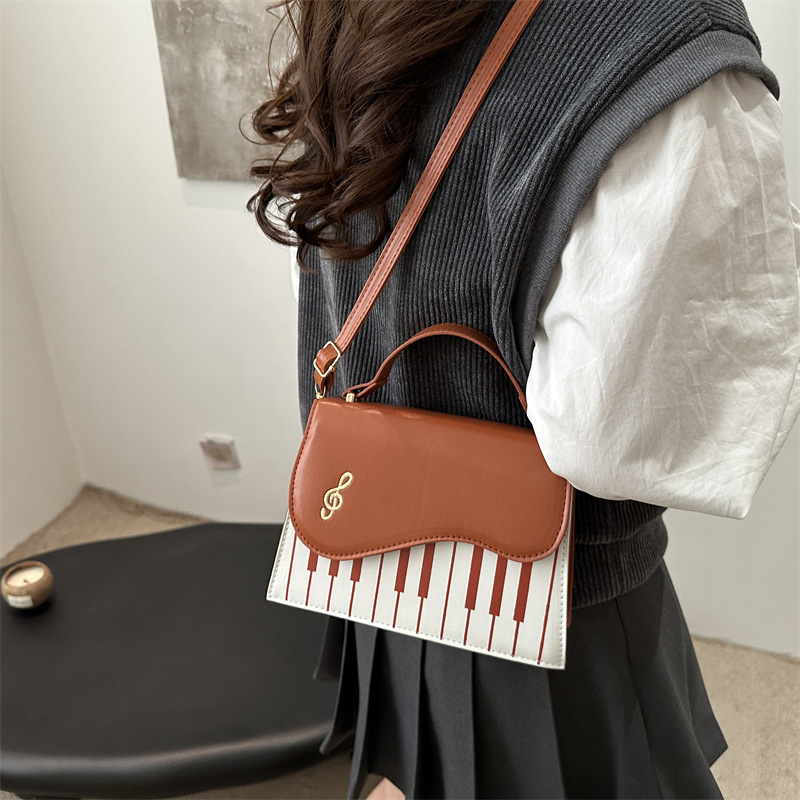 The 2024 new style women's bag, a Korean-style single-shoulder crossbody bag with piano keys and a small square bag, is a cross-border trendy women's bag details Picture