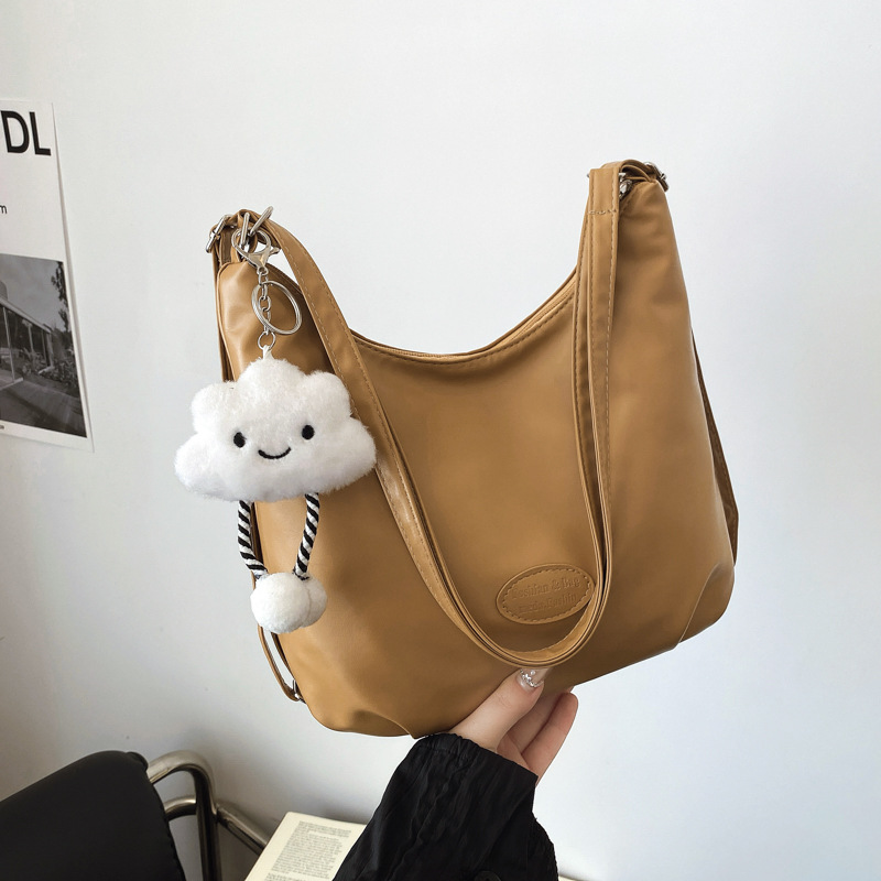 A stylish and versatile large-capacity tote bag for women in winter 2024, a simple and casual Korean version, a niche and trendy women's bag full figure