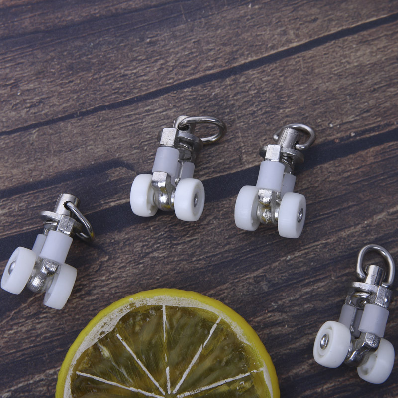 The manufacturer supplies plastic pulleys for home curtains, curtain track accessories, and various specifications of durable pulleys details Picture