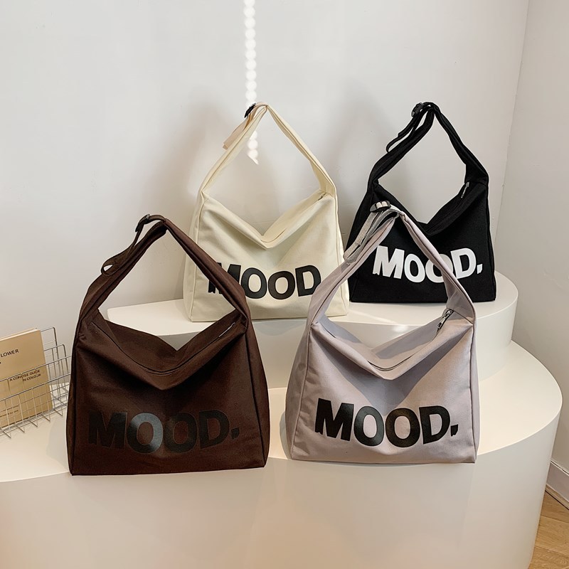 Letter canvas bag, women's crossbody bag, large-capacity Japanese-style crossbody backpack, casual and laid-back student single-shoulder bag Application Scenario