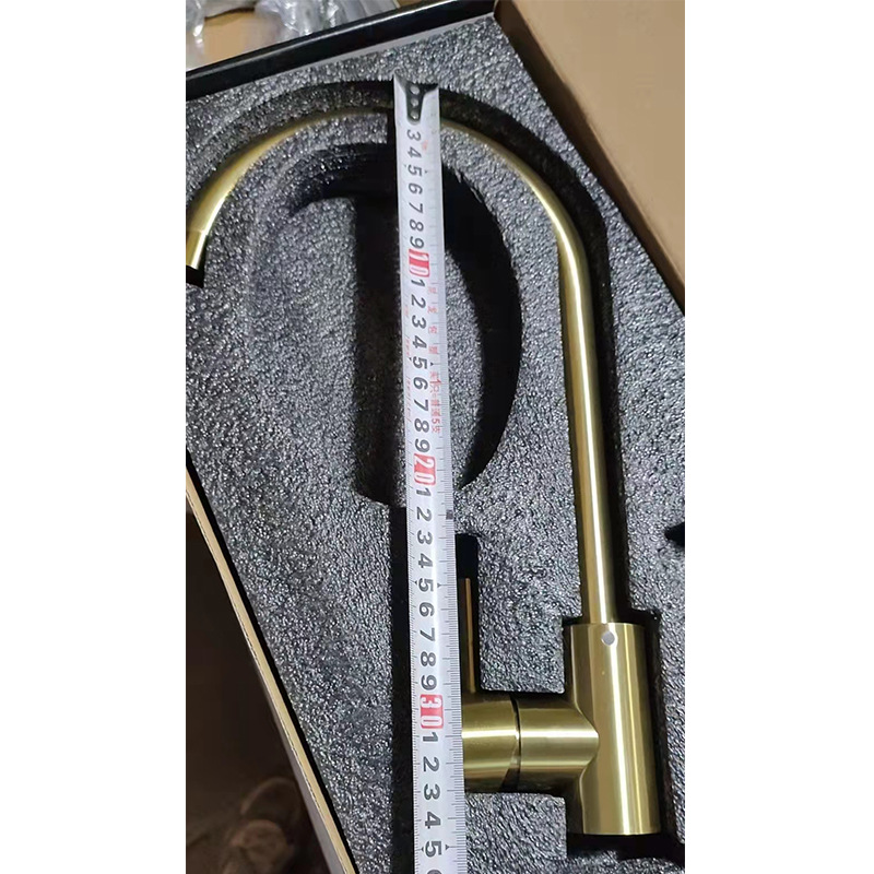 The kitchen hot and cold water faucet is rose gold with a large golden bend. It is a stainless steel household sink and a rotatable sink faucet Application Scenario