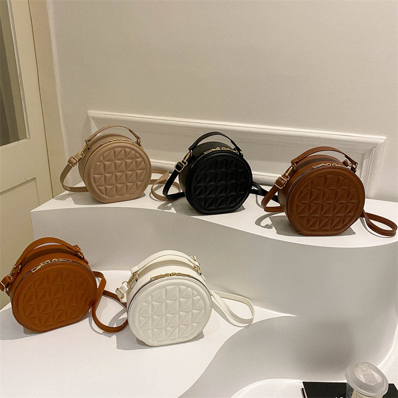 Fashionable, casual, embossed and simple 2025 Spring new style. This year's popular design is the single-shoulder crossbody small round bag Application Scenario