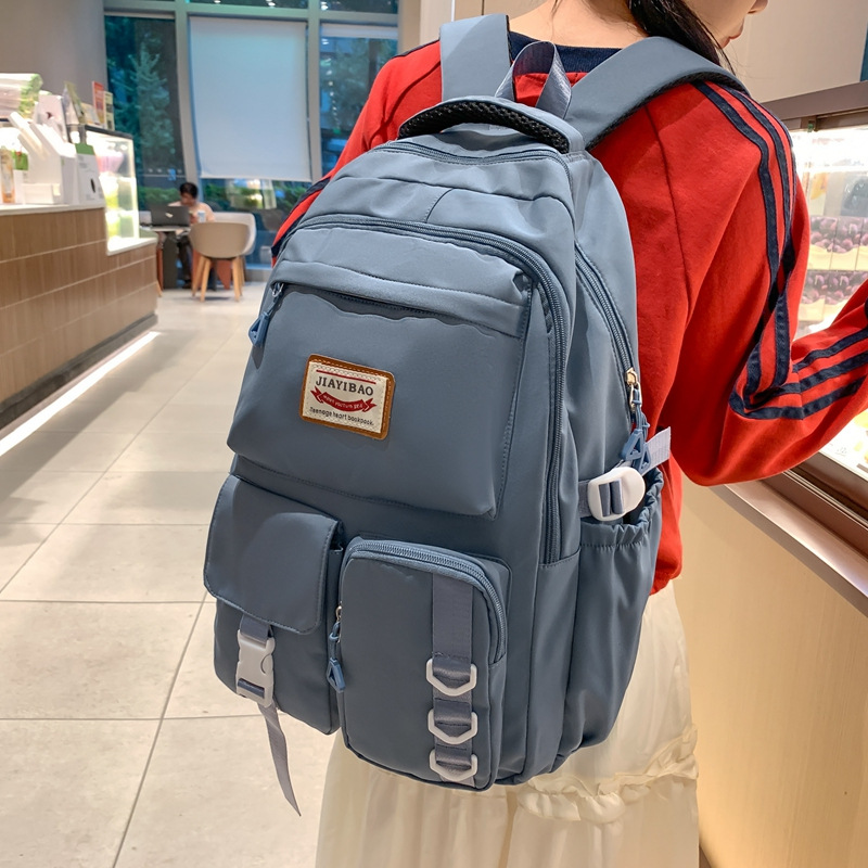 New fashionable and durable schoolbag, Korean version multi-layered backpack for junior and senior high school students, niche casual large-capacity student bag full figure