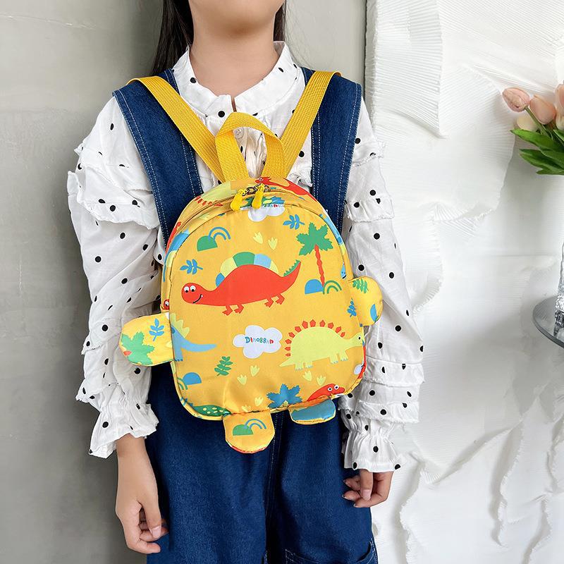 New kindergarten schoolbag, children's cartoon dinosaur small backpack, Korean version color-blocking outdoor lightweight backpack for boys and girls details Picture