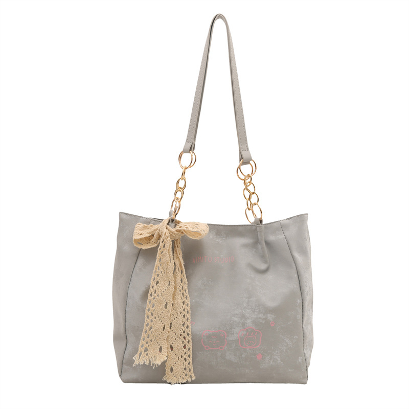 2025 New cute, stylish, trendy, simple and commuting texture printed single-shoulder underarm tote women's bag Item Picture