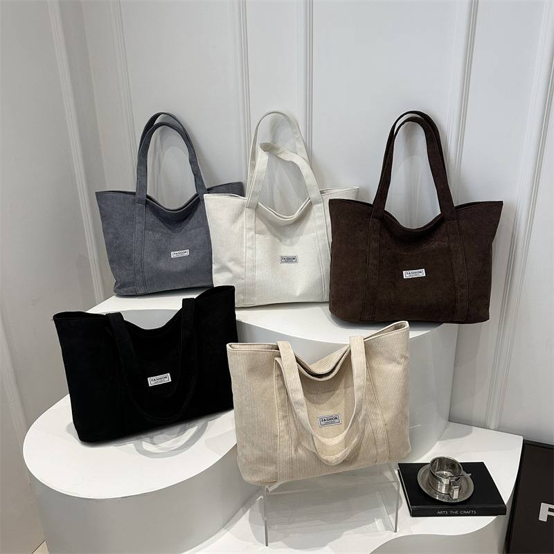 Large-capacity corduroy fabric bag for women, 2024 new style college student single-shoulder hand-carry large bag, commuter bag, tote bag Application Scenario