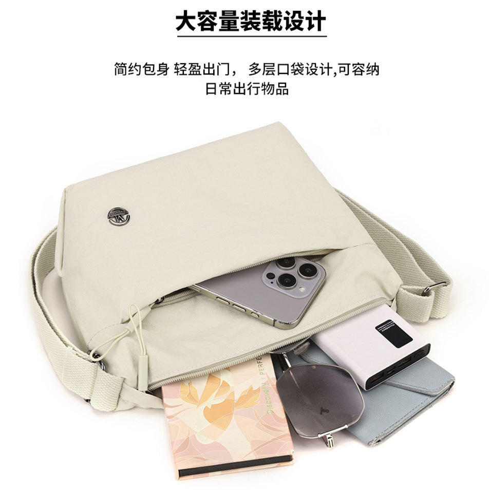 The new cross-border single-shoulder bag is a fashionable and popular women's bag with a high-end feel. It has a large capacity and is versatile. The crossbody bag is lightweight and waterproof details Picture