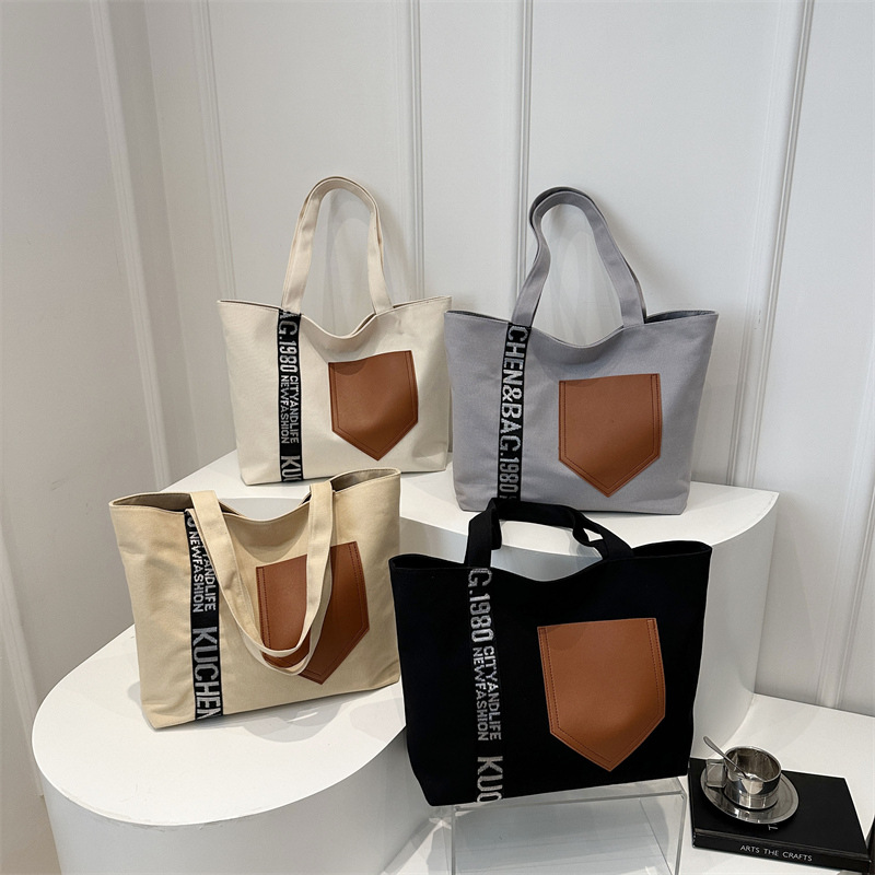 Cross-border women's canvas bag 2024 New style, high-end, stylish, large-capacity tote, simple single-shoulder crossbody commuting bag Application Scenario