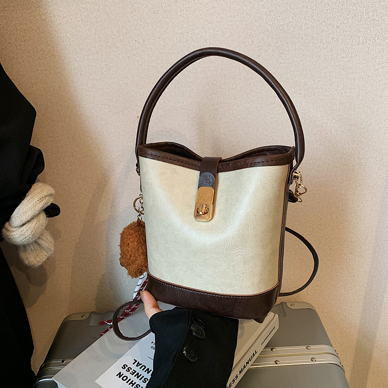 Fashionable and niche bucket bag, popular small bag, winter trend 2024 new retro single-shoulder crossbody bag full figure