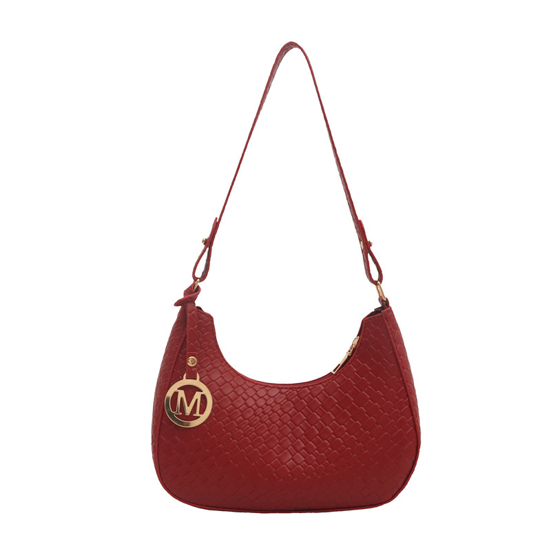 The 2025 new fashion women's bag is elegant, casual and versatile. It features a single-shoulder underarm bag in a solid color with a stylish texture and a hand-held crescent-shaped bag Item Picture