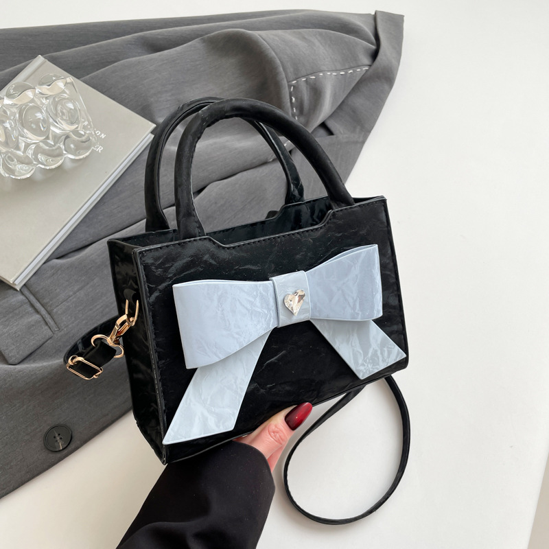 A cross-border high-end and fashionable women's handbag with a bow, a simple single-shoulder crossbody bag, and a versatile commuting bag for women full figure