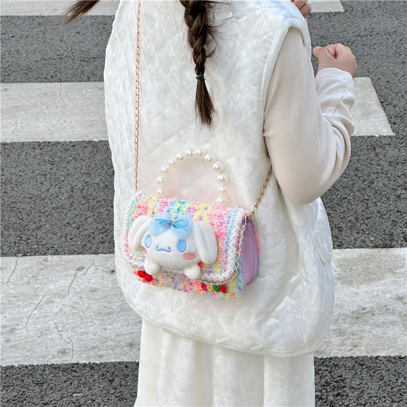 Children's pearl hand-held small crossbody bag 2024 New Year Edition woolen doll accessory single-shoulder bag Cute girl crossbody bag Application Scenario