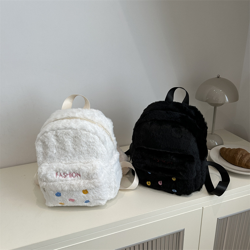 The 2024 new niche design white plush backpack is a cute and mini daily commuting fashion crossbody bag for ladies Application Scenario