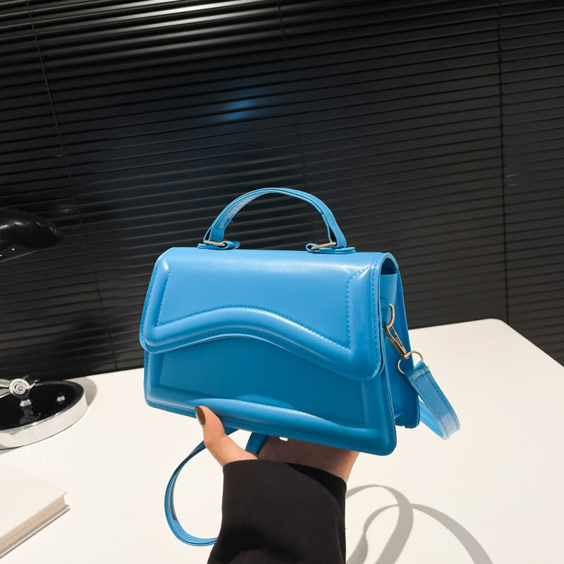 A fresh and simple embossed 2024 autumn new women's fashion solid color hand-held crossbody single-shoulder small square bag full figure