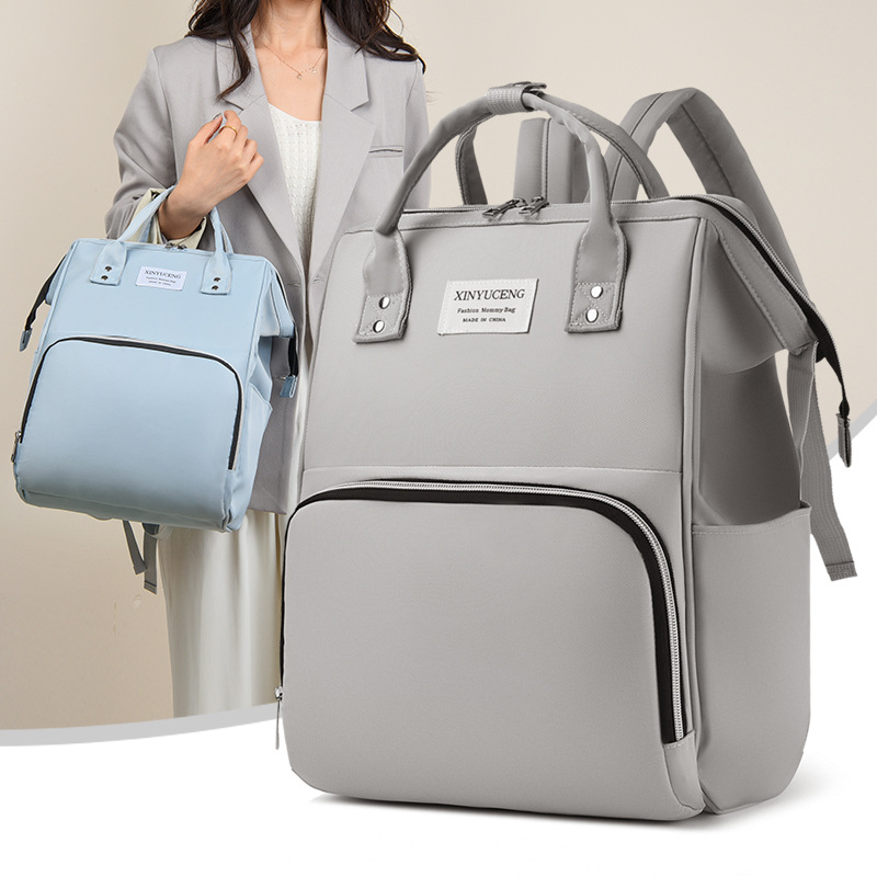 New lightweight and portable baby bag for going out, large-capacity backpack specially designed for mothers, fashionable and multi-functional hand-carry milk bag full figure