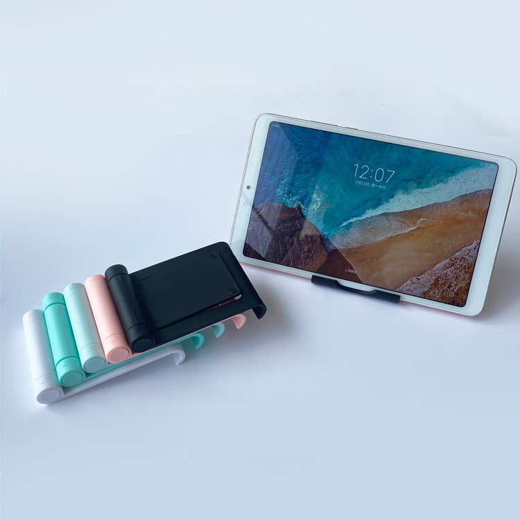 New desktop folding multi-functional stand for lazy people, suitable for mobile phones and tablets. 360° rotatable gift with LOGO printing function Specification drawing