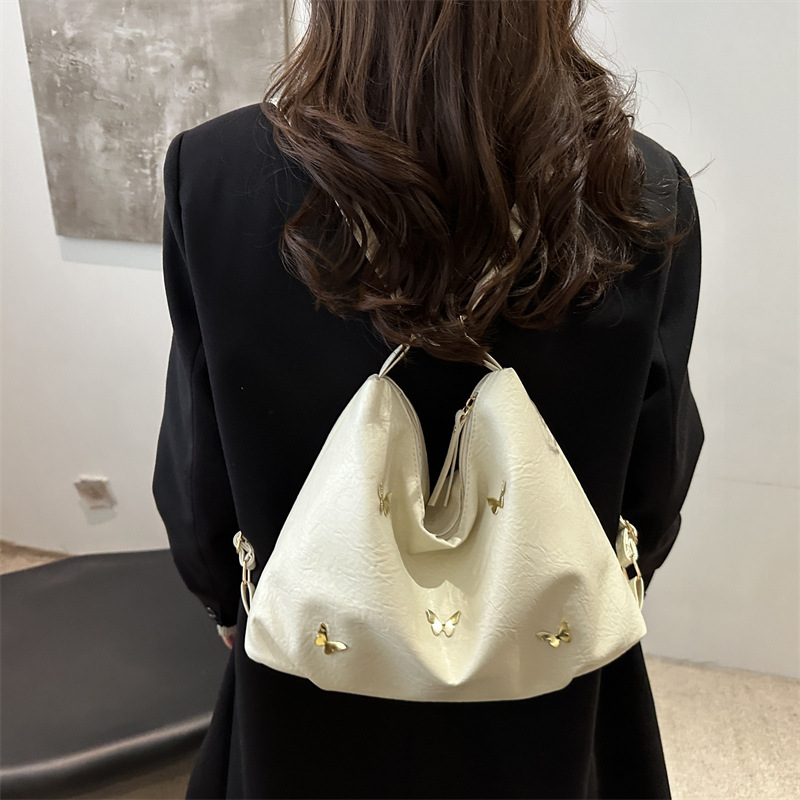 2024 New winter commuting solid color large-capacity multi-functional backpack, Butterfly hardware personalized single-shoulder crossbody bag details Picture