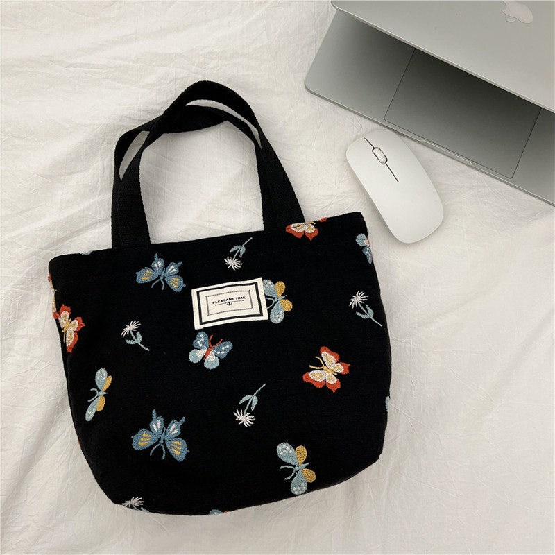 11262 Sky Blue Butterfly embroidered hand-held bag, Korean-style artistic and cute bento bag, small cloth bag for students to carry to work Application Scenario