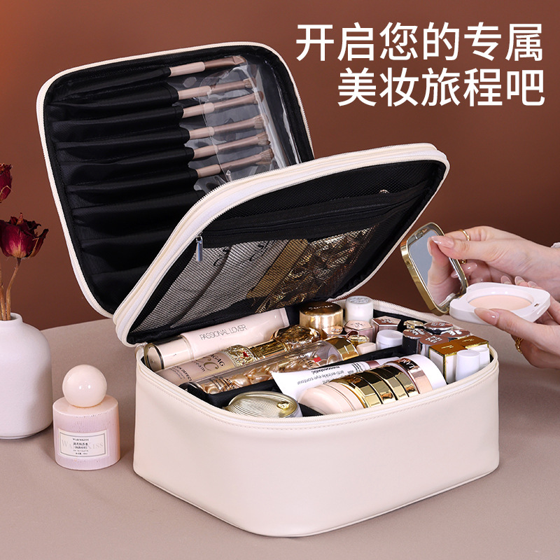 This is a portable cosmetic bag for women, with a high-end feel when going out. It has a double-layer large capacity for travel and business trips. It can store makeup brushes and is a hand-held toiletries bag full figure