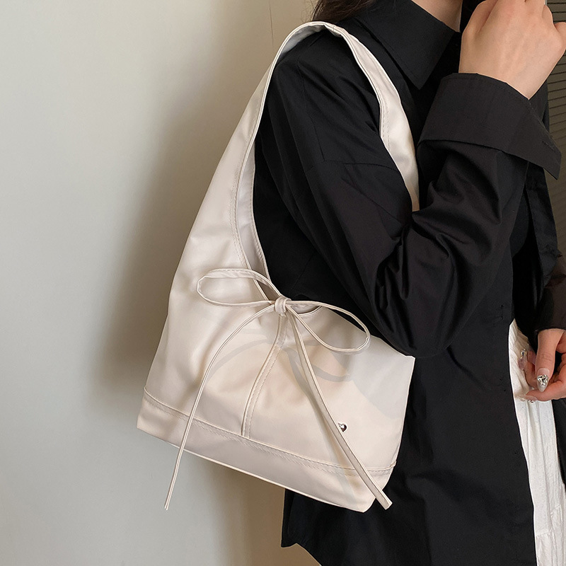 2025 Korean version niche commuter women's bag, versatile and casual bag style bow, large capacity single-shoulder underarm tote bag Specification drawing