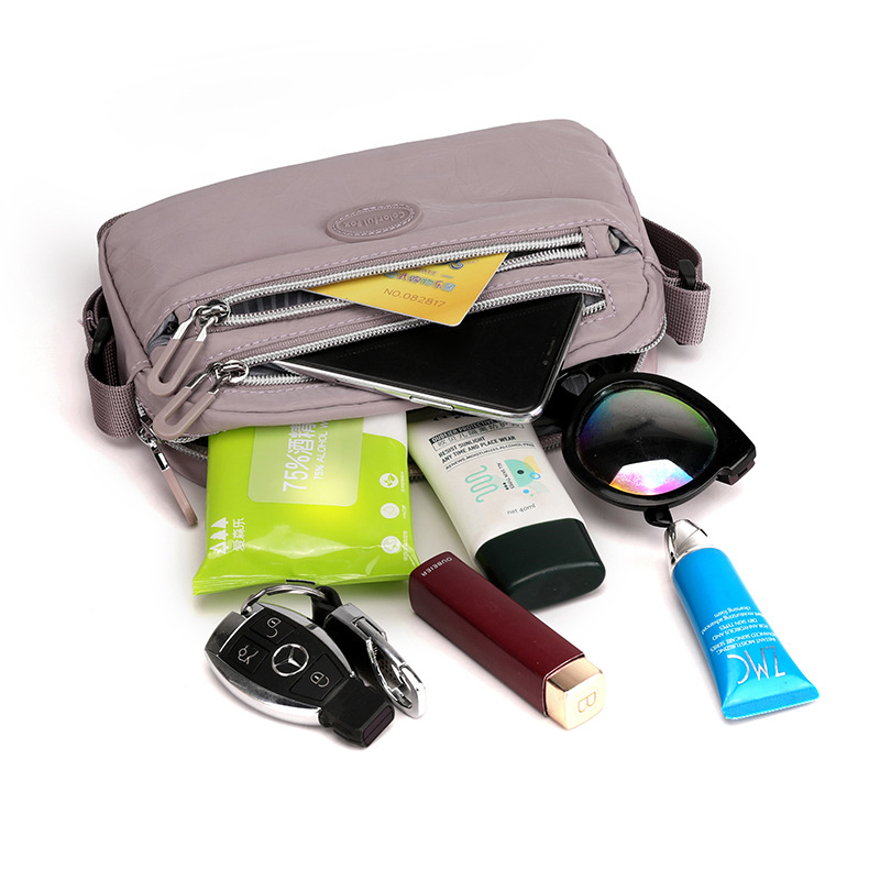 Wholesale of new women's single-shoulder bags, European and American fashion trend crossbody bags, light and simple mobile phone bags, and tree branch pattern backpacks Application Scenario