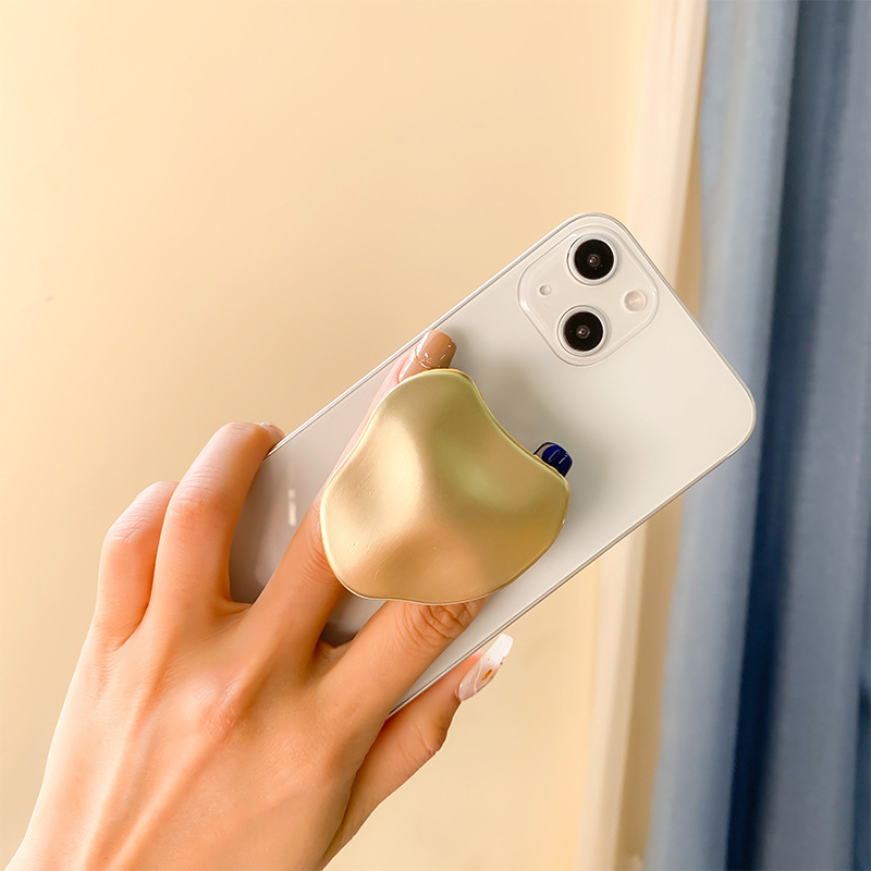 Metal high-end electroplated mobile phone airbag stand, adhesive retractable desktop air cushion support, back adhesive ring buckle Application Scenario
