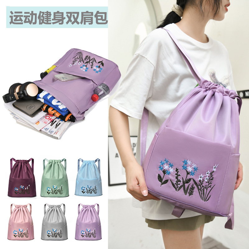 The 2025 new embroidered, wear-resistant, foldable and waterproof travel bag is a lightweight, fashionable and trendy nylon backpack full figure